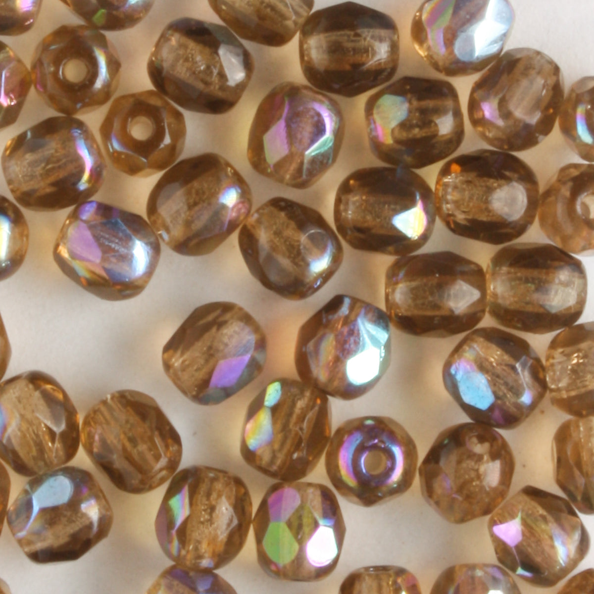 4mm Round Fire Polish Smoked Topaz AB