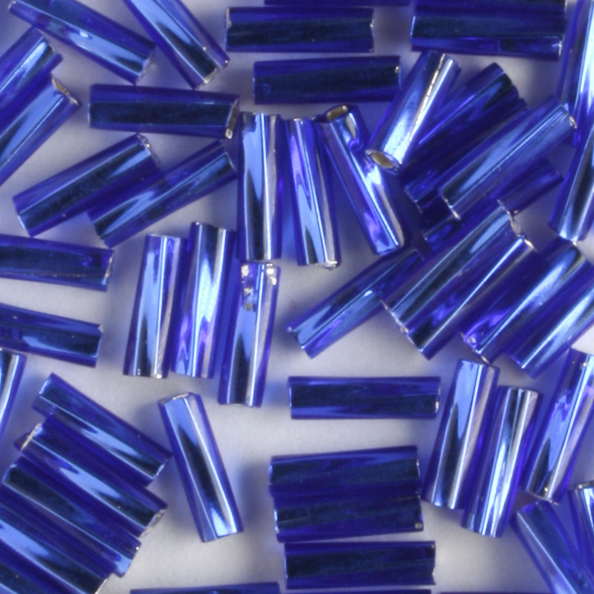 6mm Twisted Bugle Silver Lined Sapphire Blue