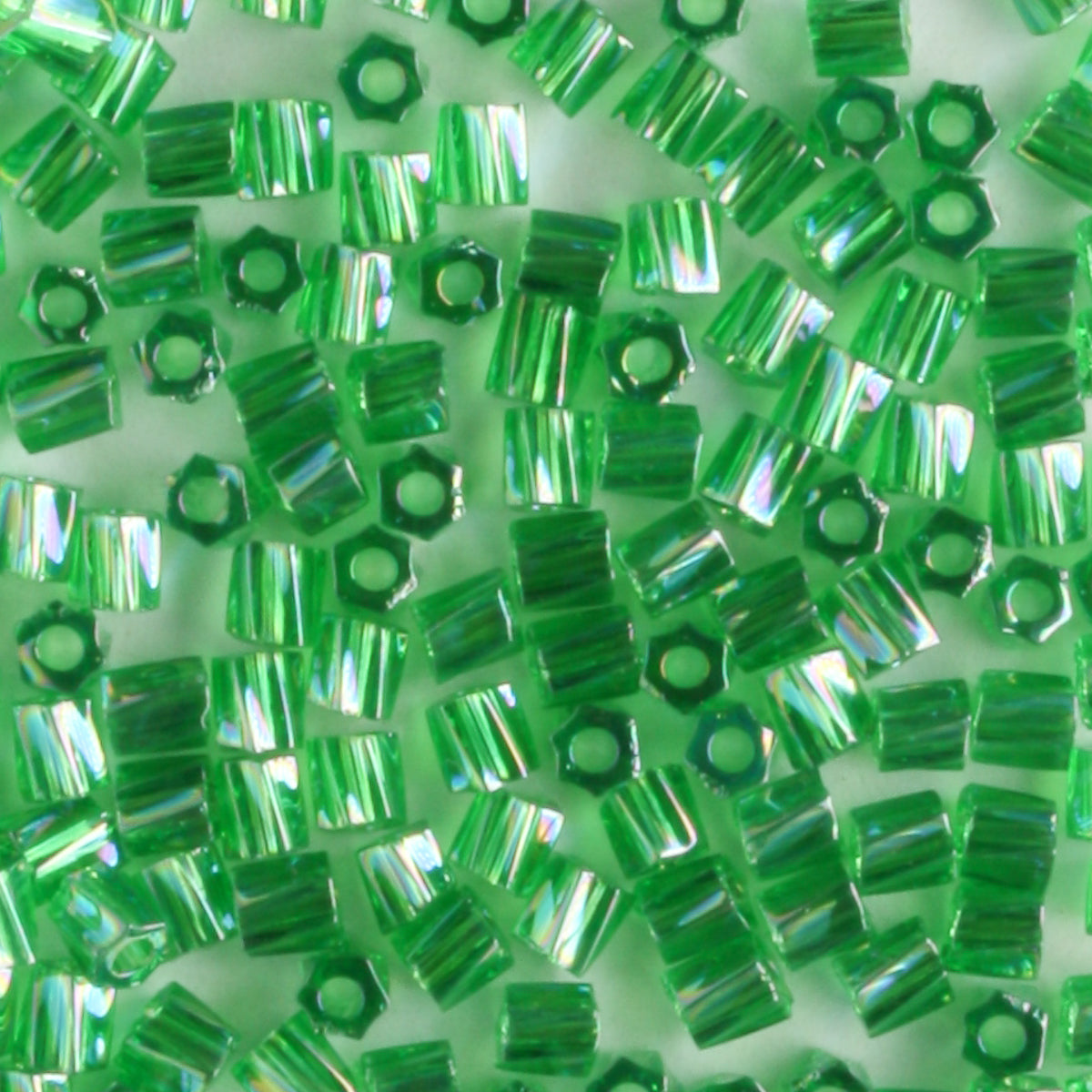 10/0 Hex Cut with a Twist Transparent Rainbow Green - 10 grams