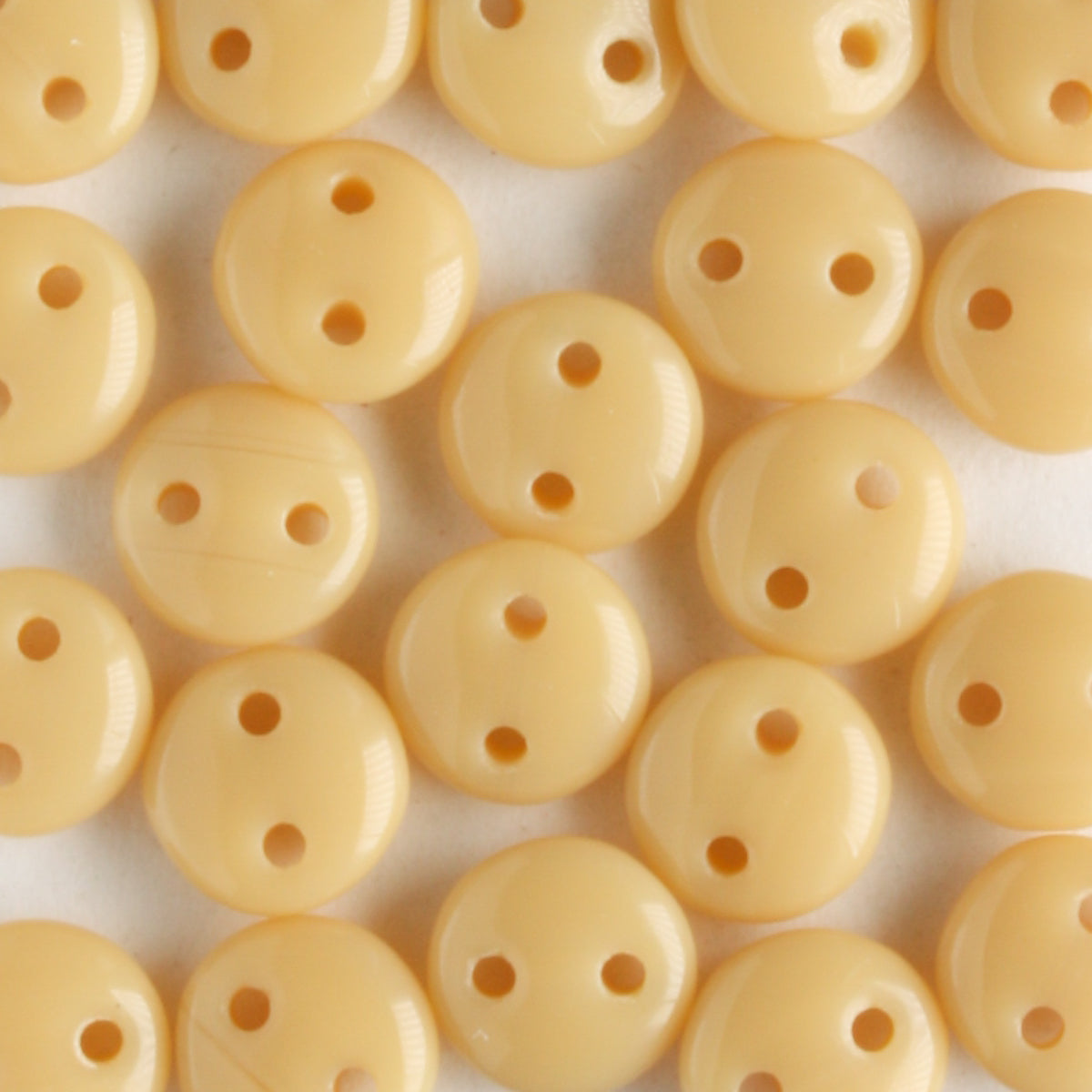 2 Hole Lentil Opaque Beige - 50 beads