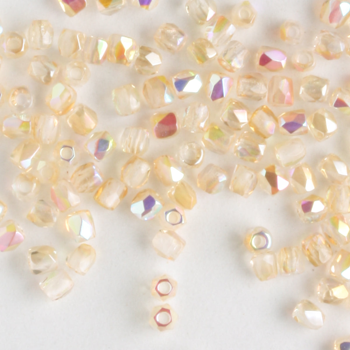 True 2mm Round Fire Polish Crystal Yellow Rainbow