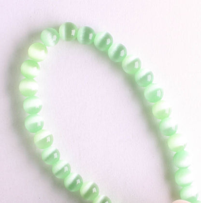 4mm Cat's Eye Glass - 8" strand