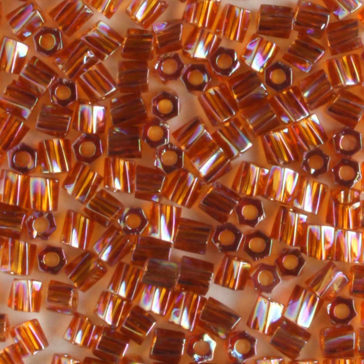10/0 Hex Cut with a Twist Transparent Rainbow Amber - 10 grams