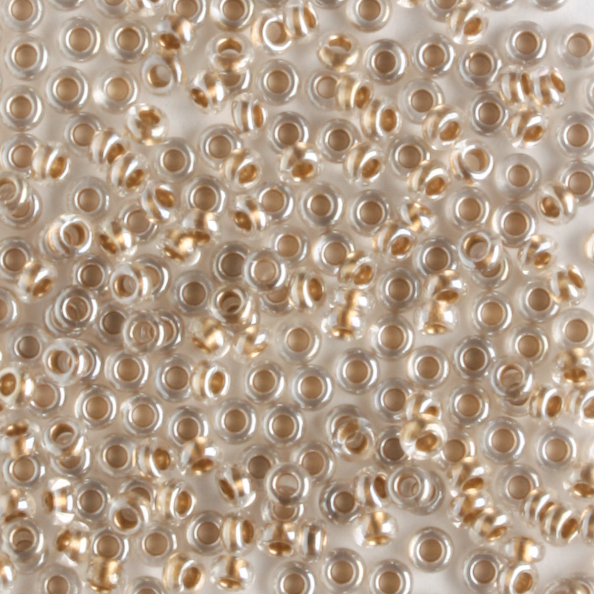 11/0 Demi Round Gold Lined Crystal - 10 grams
